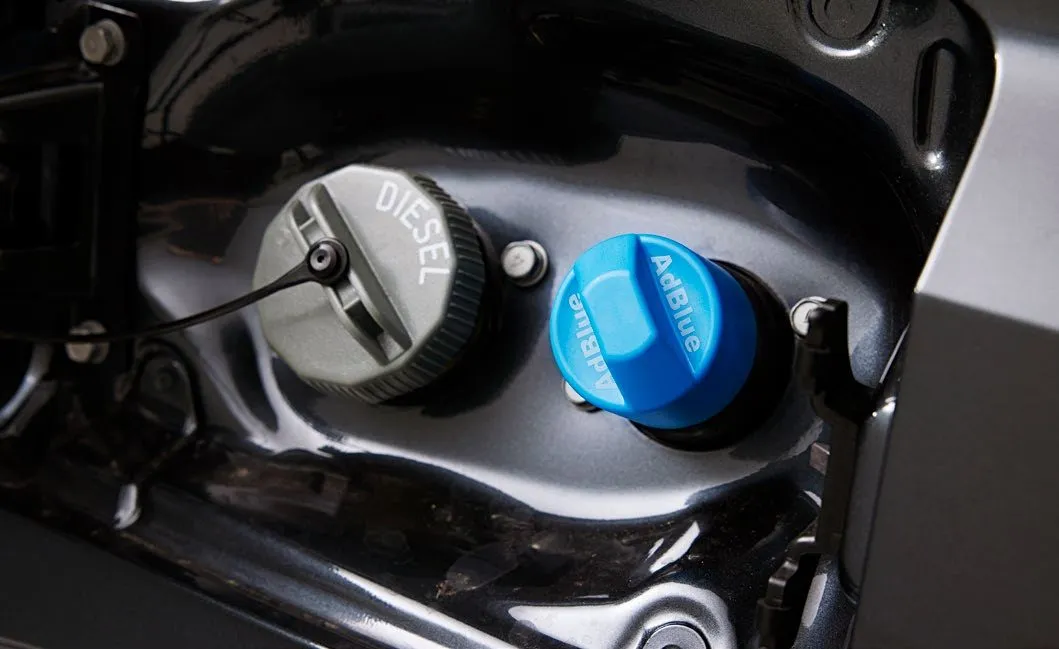 AdBlue and diesel filler caps on the Mitsubishi Triton