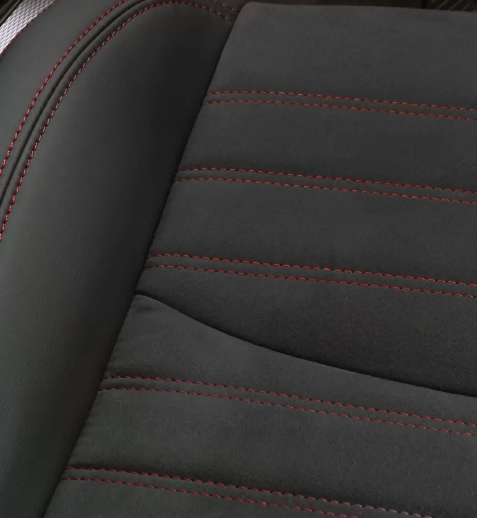 Leather-appointed seat with red stitching