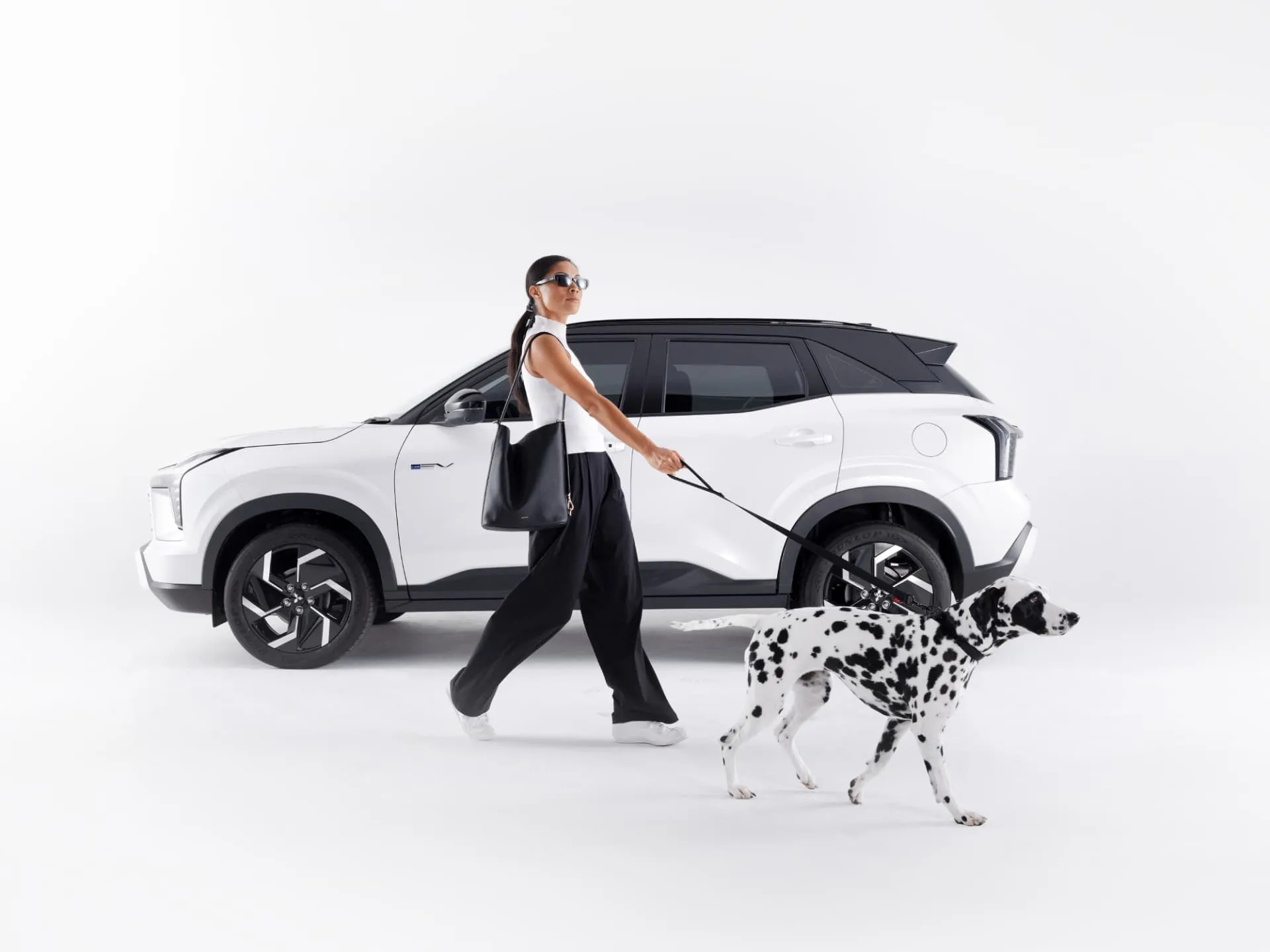 Outlander Sport HEV in side profile