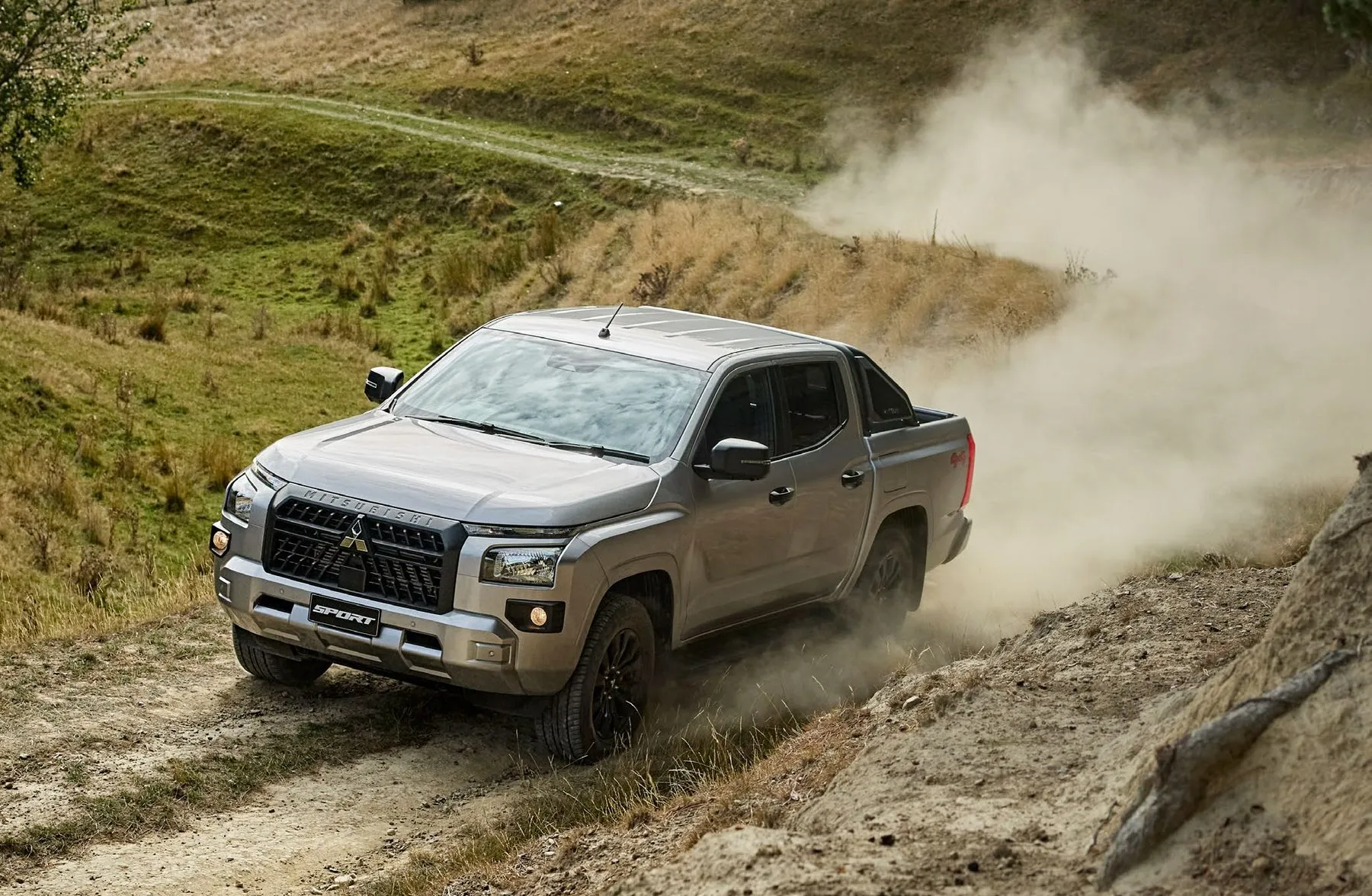 Triton GLX-Sport driving on a gravel track