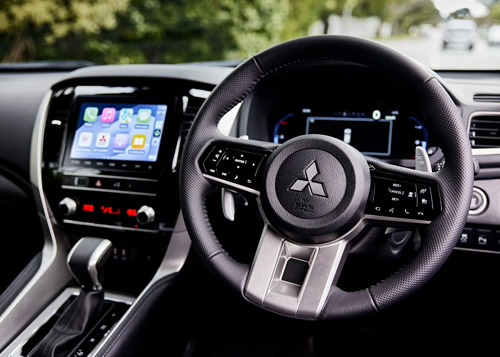 Pajero Sport 8-inch touchscreen showing Apple CarPlay