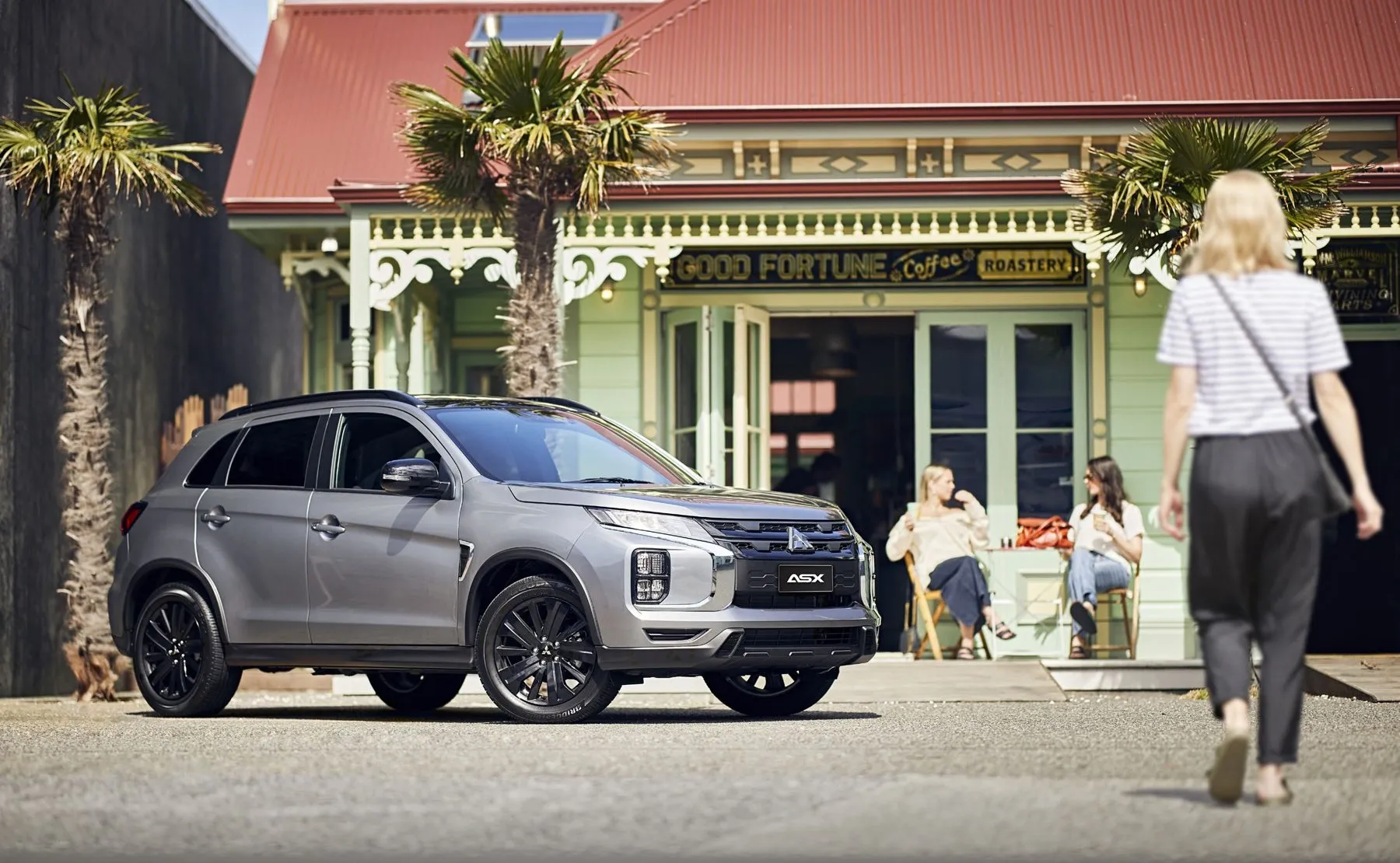 Mitsubishi ASX parked outside a cafe
